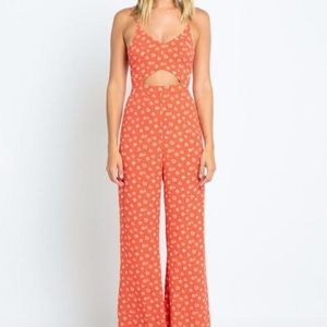 Red floral jumpsuit. Size medium.